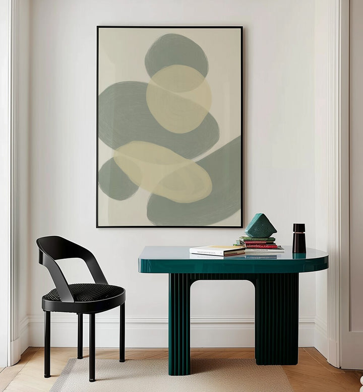 Portare by Yopie Studio Abstract Paintings Abstract Art Prints in Black Plain Frame placed on a wall behind a study table