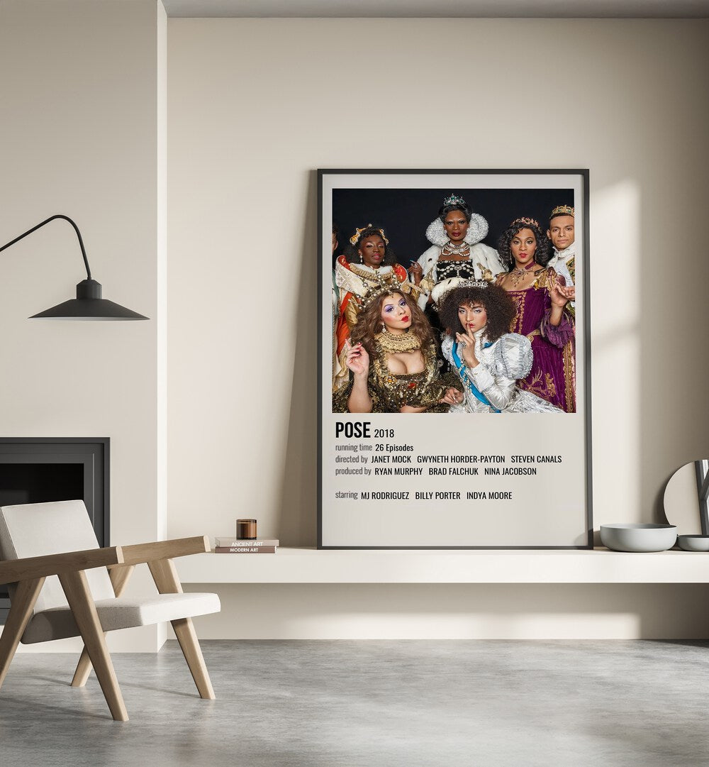 Pose 2018 Movie Posters in Black Plain Frame place on a wall behind a chair beside lamp