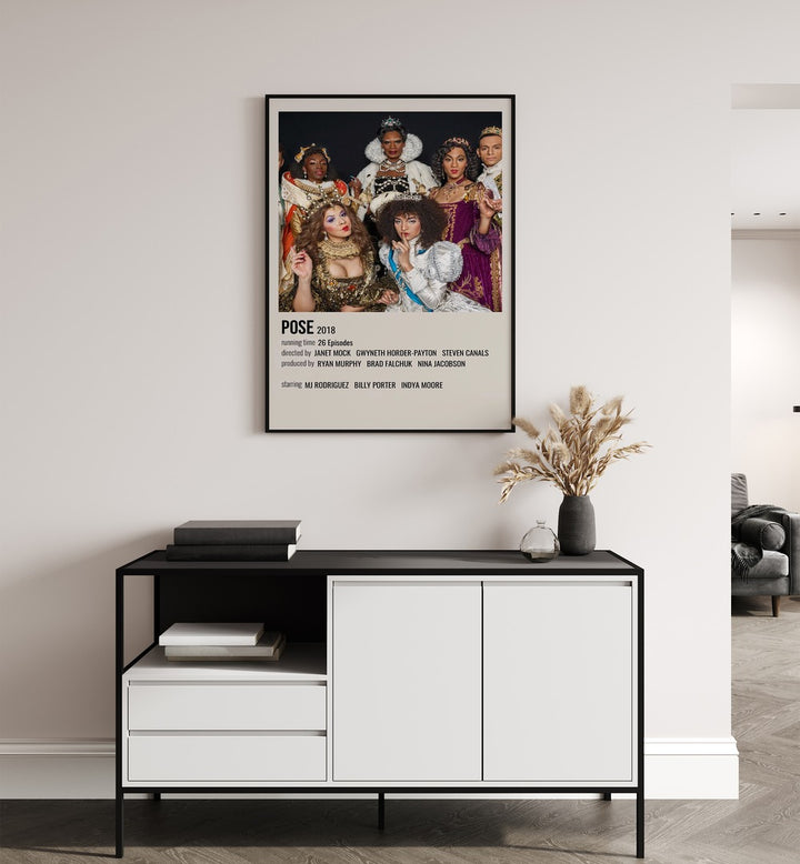 Pose 2018 Movie Posters in Black Plain Frame hanging on wall above console table
