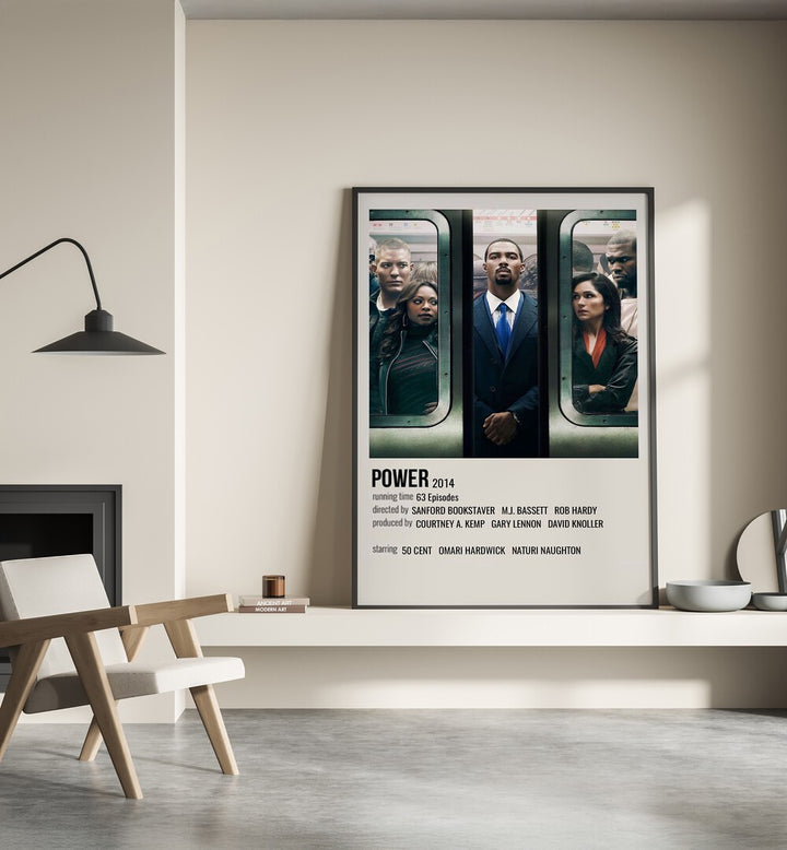 Power 2014 Movie Posters in Black Plain Frame place on a wall behind a chair beside lamp