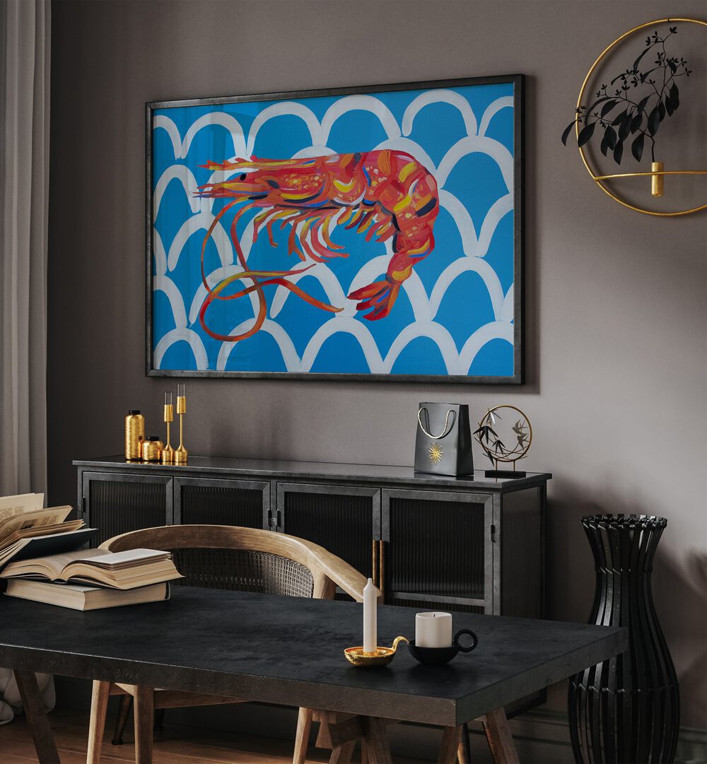 Prawn on Blue Wavey by Alice Straker Cafe Art Prints Cafe Posters in Black Plain Frame placed on a wall behind a console table