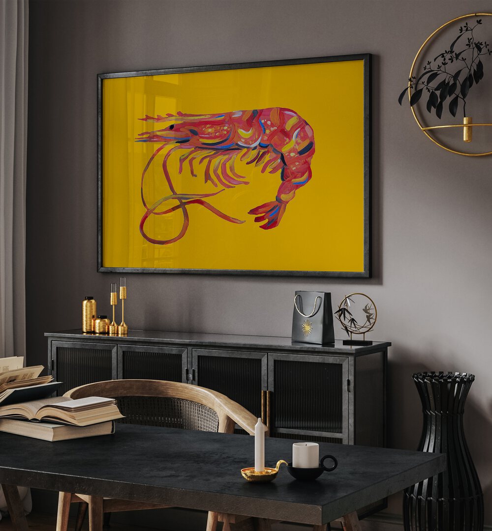 Prawn on Yellow by Alice Straker Cafe Art Prints Cafe Posters in Black Plain Frame placed on a wall behind a black console table