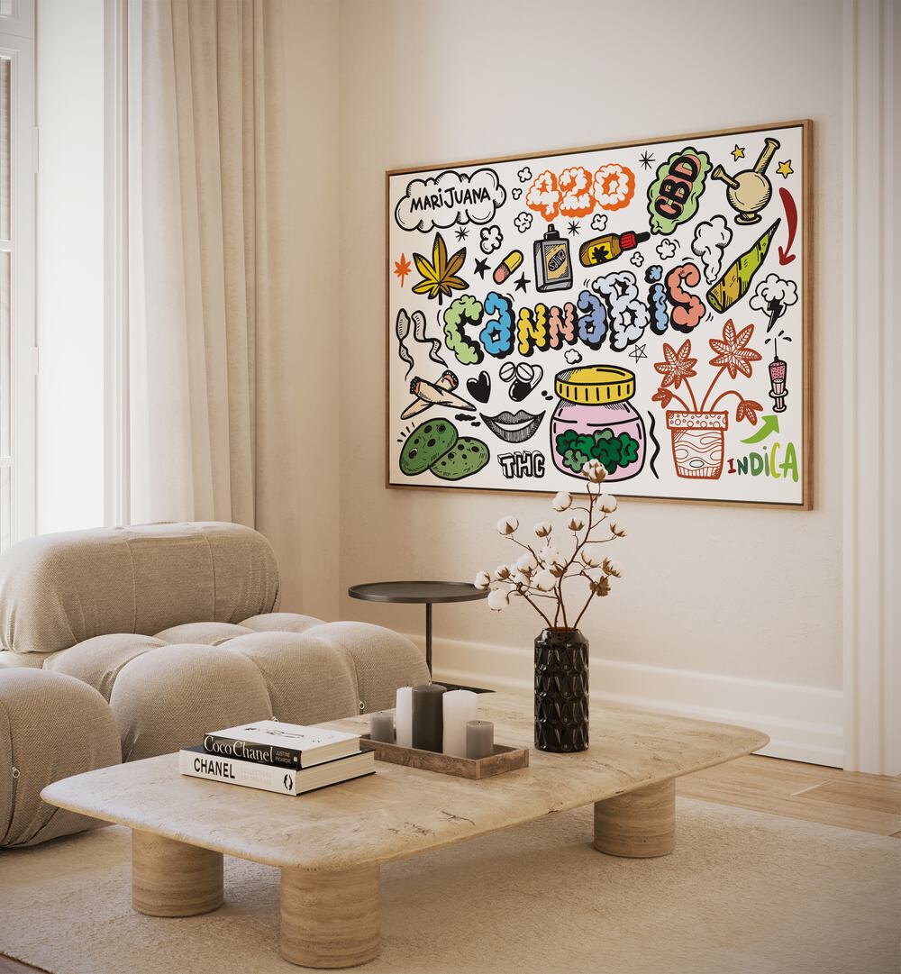 Puff Puff Pass Doodle Art Painting in Oak Wood Plain Frame it is placed on the wall beiside the sofa chair.