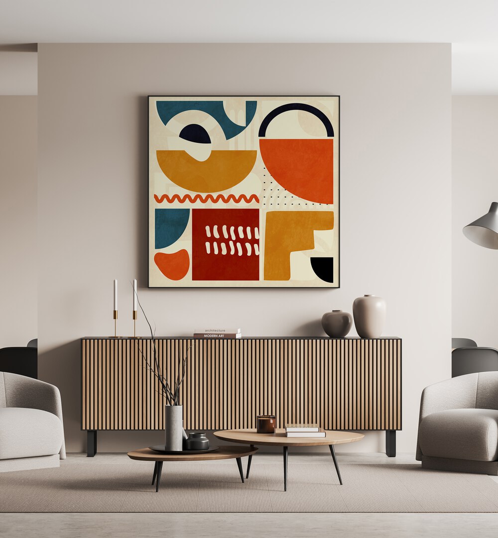 Quadrate Bunt I By Ana Rut Bre Abstract Art Abstract Paintings in Black Plain Frame placed on a Beige Colored Wall above a Console Table in the Living Room