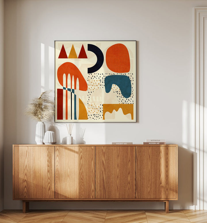 Quadrate Bunt II By Ana Rut Bre Abstract Art Abstract Paintings in Black Plain Frame placed on a Cream Colored Wall above a Console Table 