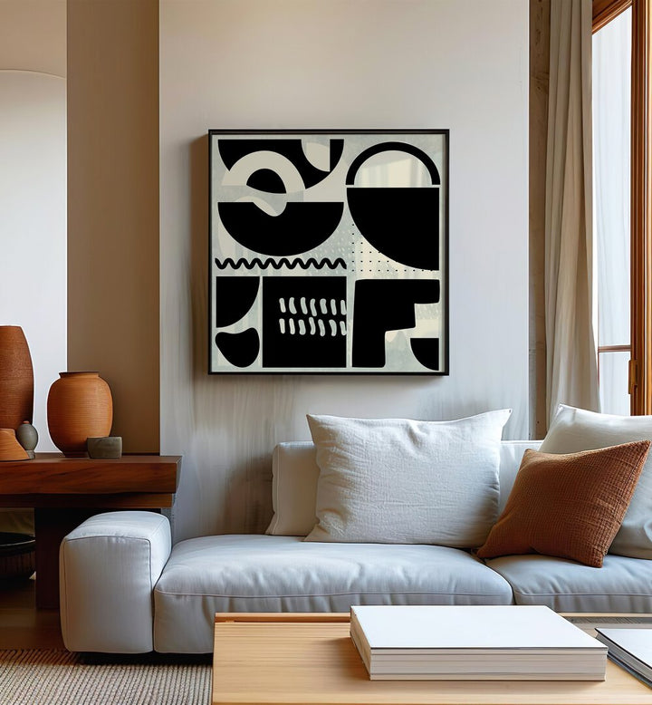 Quadrate SW Kopie II By Ana Rut Bre Abstract Art Abstract Paintings in Black Plain Frame placed on a Beige Colored Wall near a White Sofa  in the Living Room