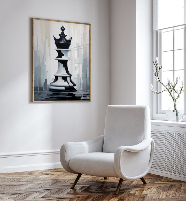 Queen Gaming Posters in Oak Wood Plain Frame placed on a White Colored Wall near a White Sofa Chair in the Drawing Room