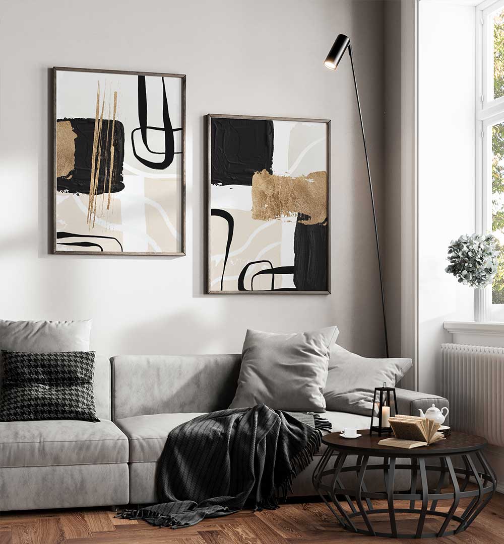 Modern living room with abstract art, gray sofa, and coffee table.