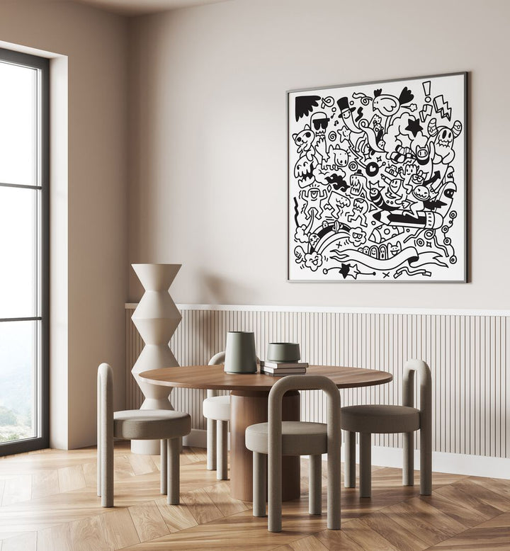 Quirk Quest Doodle Art Painting in Black Plain Frame it is placed on the wall behind the dinning table