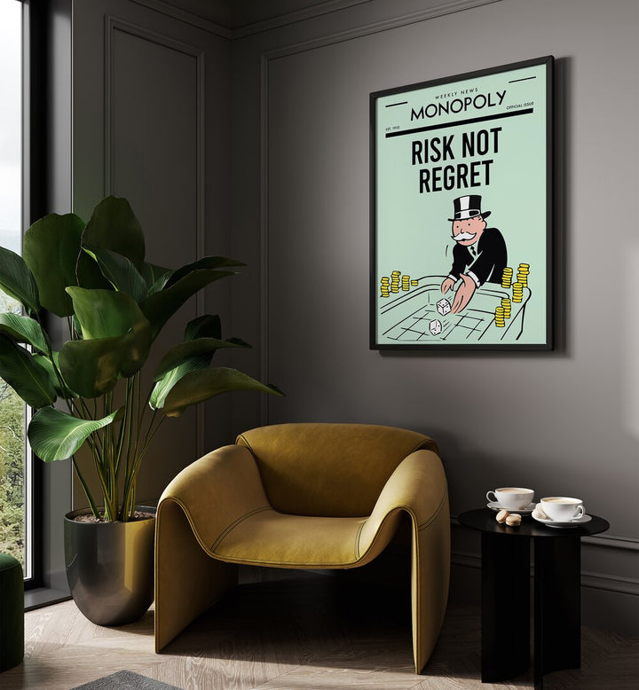 Risk not Regret Money Art Artwork in plain black frame hanging on wall near window above brown chair