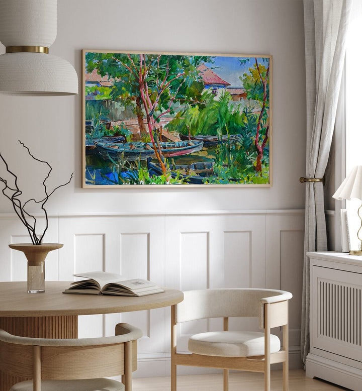 Vibrant RIVER VILLAGE, LANDSCAPE PAINTINGS adorns a cozy interior, enhancing serene waterside living. Perfect for décor!