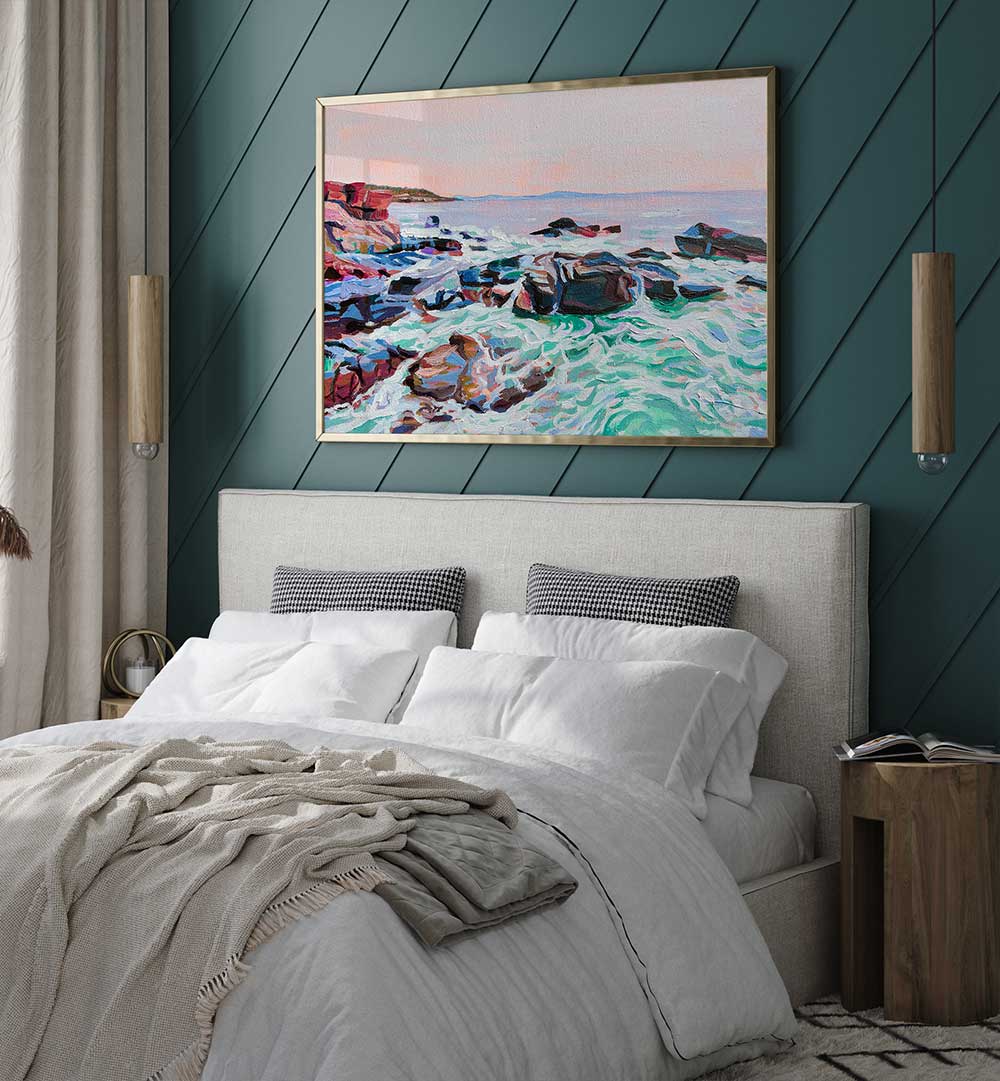 Framed coastal seascape THUNDER HOLE , BEACH PAINTINGS showing crashing waves and rocky shoreline hung above a bed