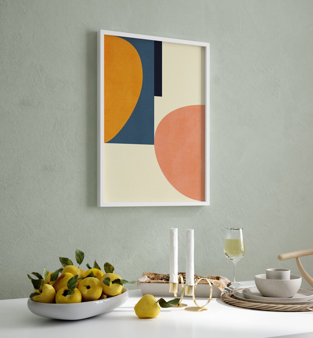 Rainbow Plus Shapes Blue Mustard I By Ana Rut Bre Abstract Art Abstract Wall Art in White Plain Frame placed on a wall behind a dining table 