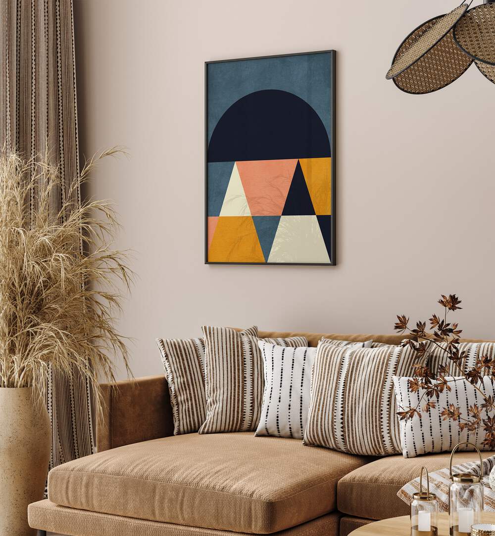 Rainbow Plus Shapes Blue Mustard Iv By Ana Rut Bre Abstract Art Abstract Wall Art in Black Plain Frame placed on a wall behind a sofa