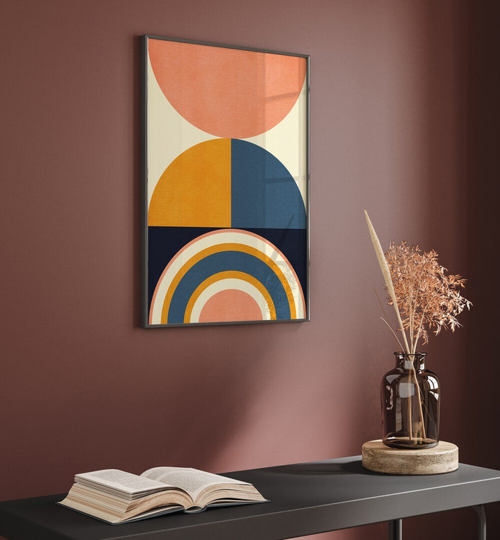 Rainbow Plus Shapes Blue Mustard X By Ana Rut Bre Abstract Art Abstract Wall Art in Black Plain Frame placed on a wall behind a table