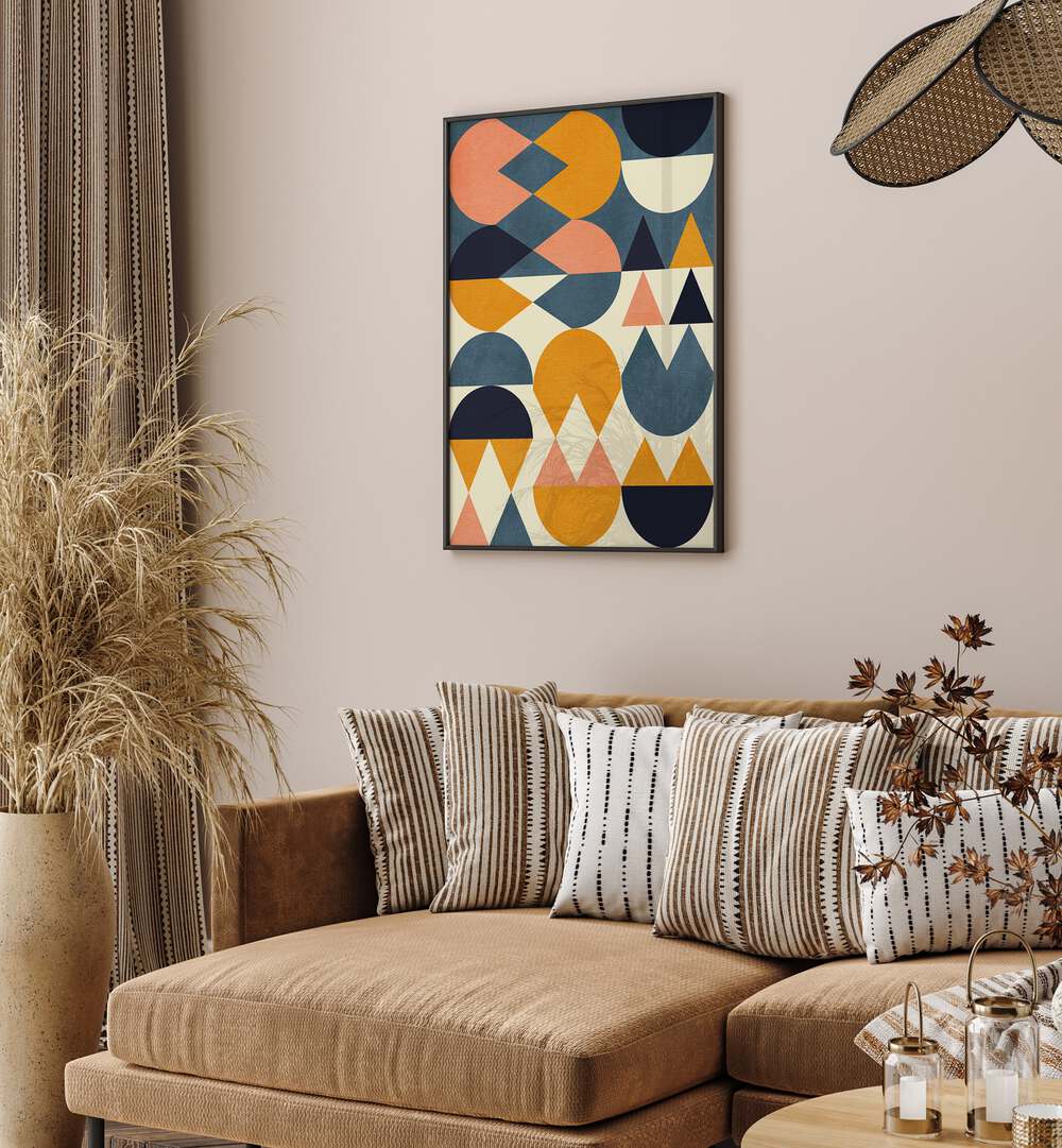 Rainbow Plus Shapes Blue Mustard vi By Ana Rut Bre Abstract Art Abstract Wall Art in Black Plain Frame placed on a wall behind a sofa