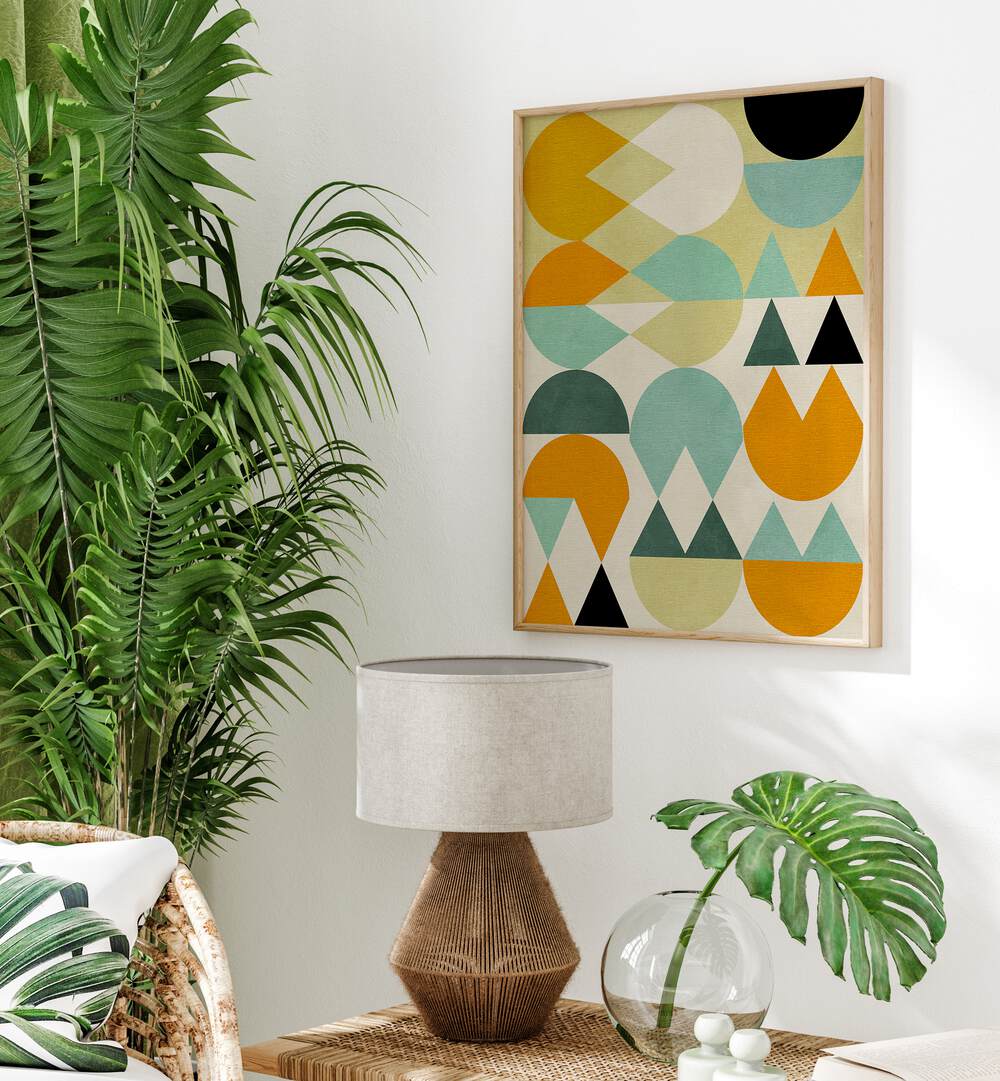 Rainbow Plus Shapes V By Ana Rut Bre Abstract Art Abstract Wall Art in Oak Wood Plain Frame placed on a wall behind a table