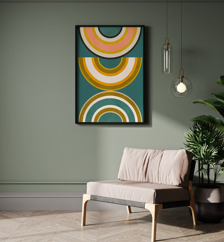 Rainbow Suns V Kopie By Ana Rut Bre Abstract Art Abstract Wall Art in Black Plain Frame placed on a wall beside a sofa