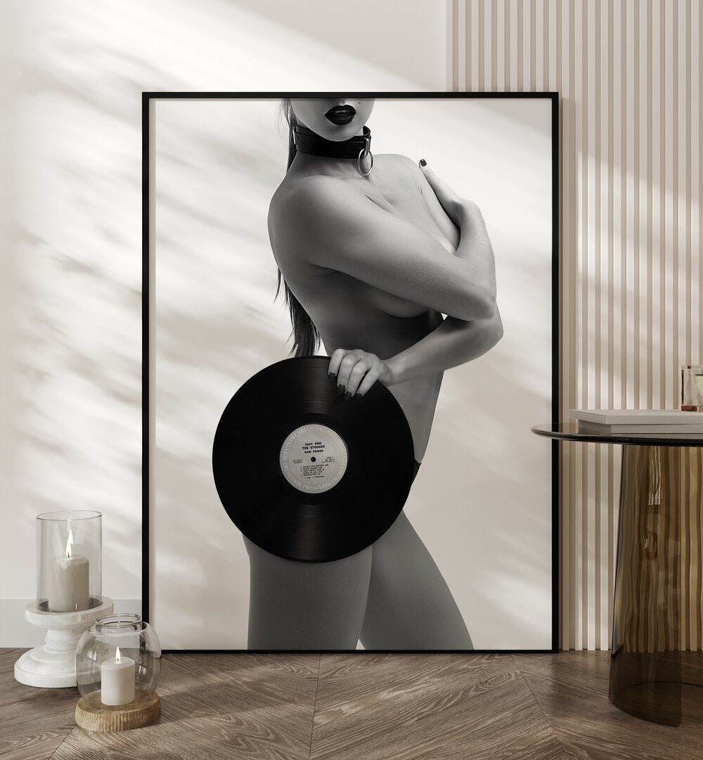 Raw Power Aye Oh Let by David Drake Fine Art Photography Fashion Photography in Black Plain Frame placed on the floor between candles and a table