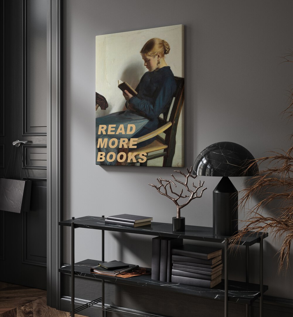 Read More Books by the Art Concept Altered Art Prints in Gallery Wrap placed on a wall behind a table and beside a door