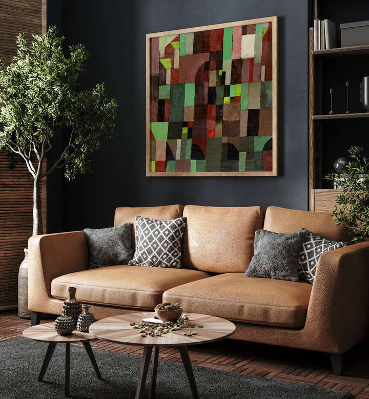 Red And Green Architecture 1922 Vintage Paintings in Oak Wood Plain Frame placed on a wall behind an orange sofa in a living room