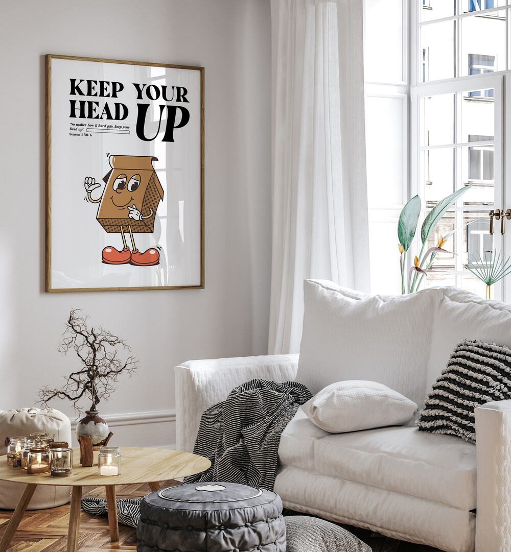 Resilience Rising: Keep Your Head Up Quotes and Typography Posters in Oak Wood Plain Frame placed on a living room wall beside a sofa 