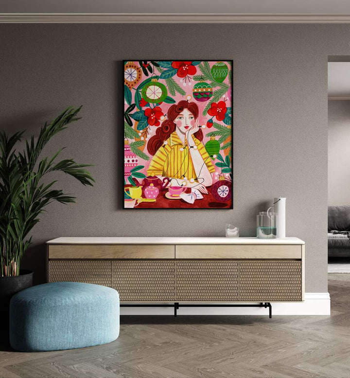 Retro Christmas Woman By Caroline Bonne Muller Women Paintings in Black Plain Frame on a wall above a  console table