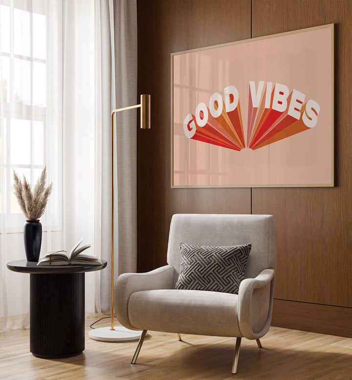 Retro Good Vibes ii Quotes and Typography Posters in Oak Wood Plain Frame placed on a wall behind a chair