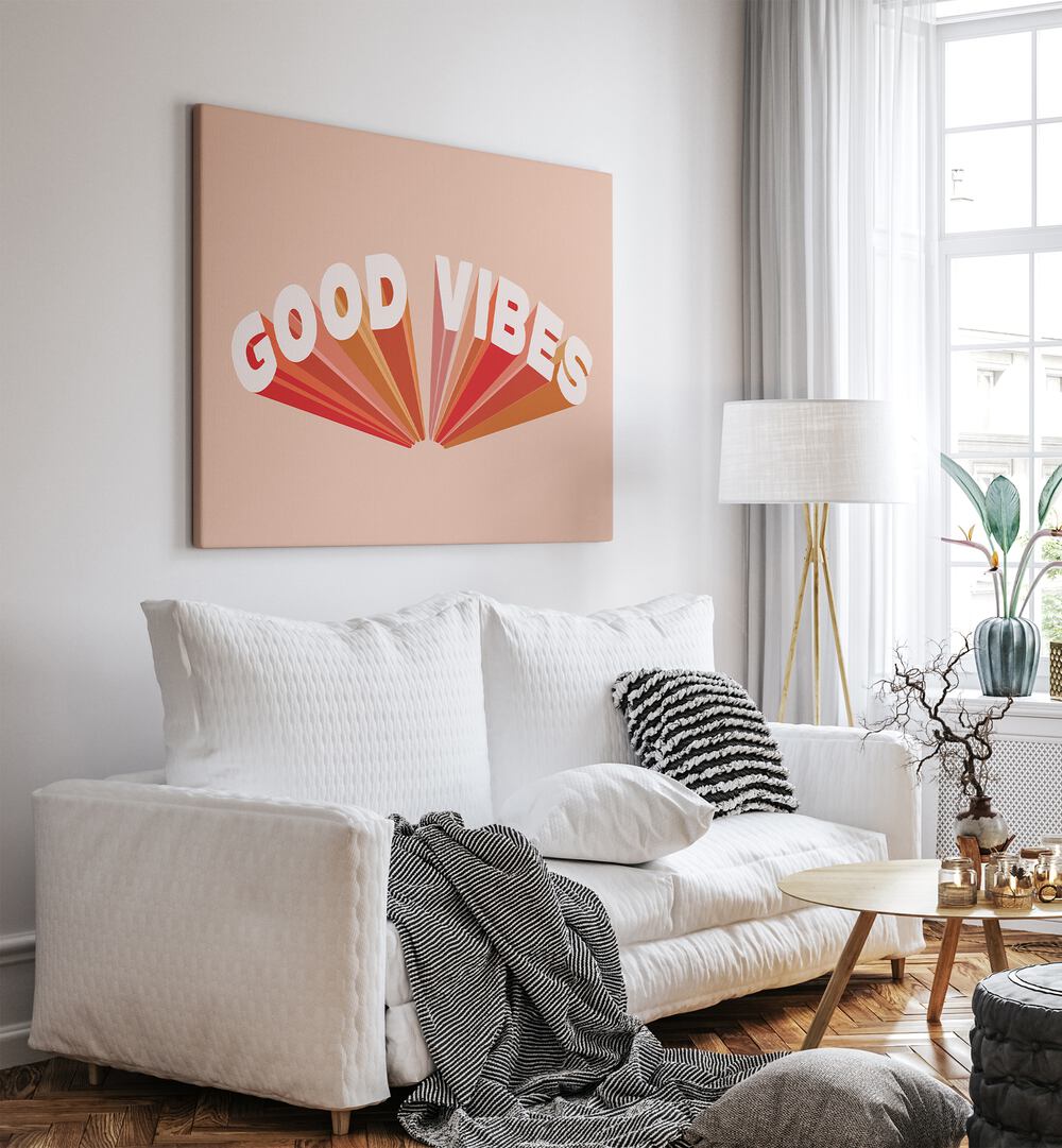 Retro Good Vibes ii Quotes and Typography Posters in Gallery Wrap placed on  a wall in a living room behind  a white sofa