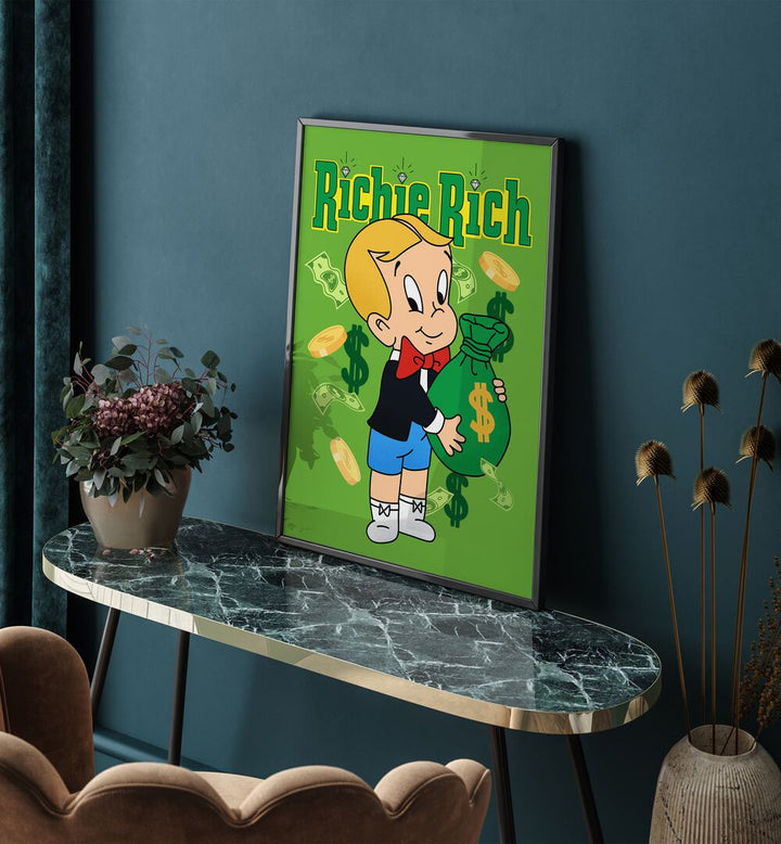 Riche Rich Comic Wall Art Comic Posters in Black Plain Frame placed on a Console Table near a Blue Colored Wall 