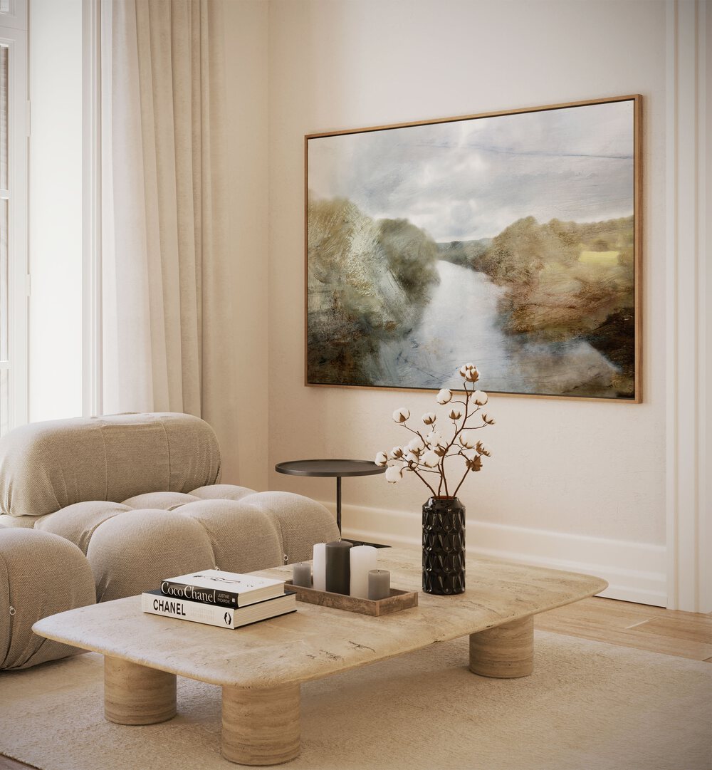 River By Dan Hobday Landscape Art Prints Landscape Paintings in Oak Wood Floater Frame placed on a Cream Colored Wall near a Beige Sofa in the Living Room