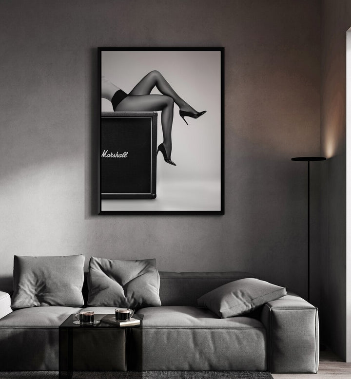 Rock N Legs by David Drake Fine Art Photography Fashion Photography in Black Plain Frame placed on a living room wall behind a sofa