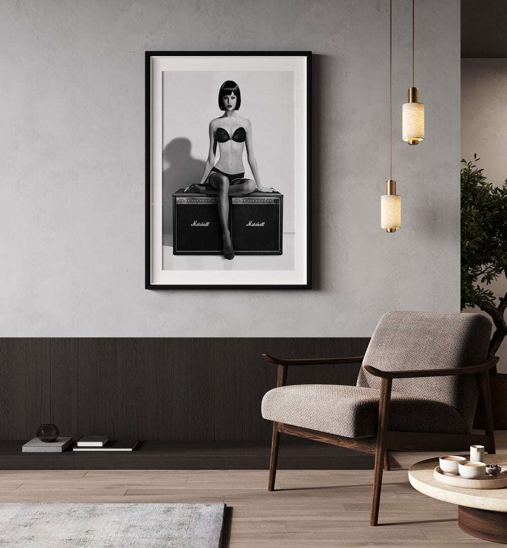 Rock This by David Drake Fine Art Photography Fashion Photography in Black Frame With Mount placed on wall behind a chair