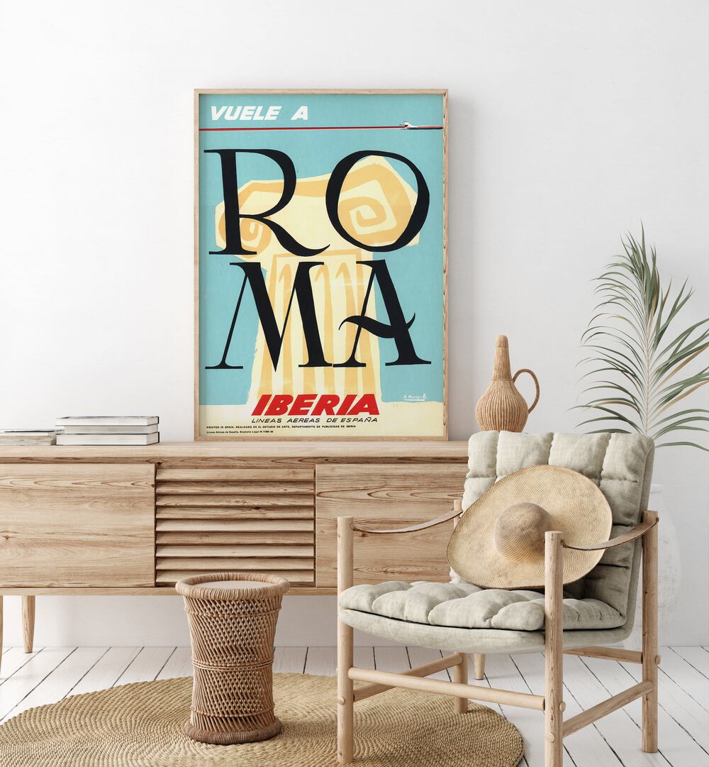 Roma  Retro Travel Posters in Oak Wood Plain Frame placed on a console table behind a chair