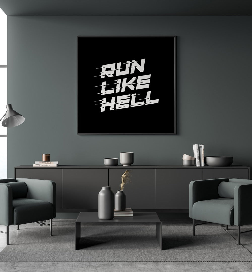 Run Like Hell Quotes and Typography Posters in Black Plain Frame placed on on a wall behind a console table