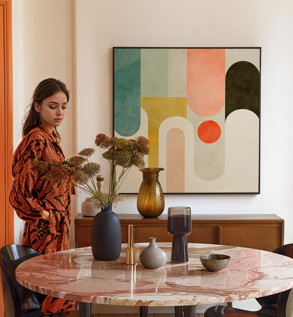 Runde Shapes Kopie By Ana Rut Bre Abstract Art Abstract Paintings in Black Plain Frame placed on a Cream Colored Wall near a Dining Table in the Dining Room