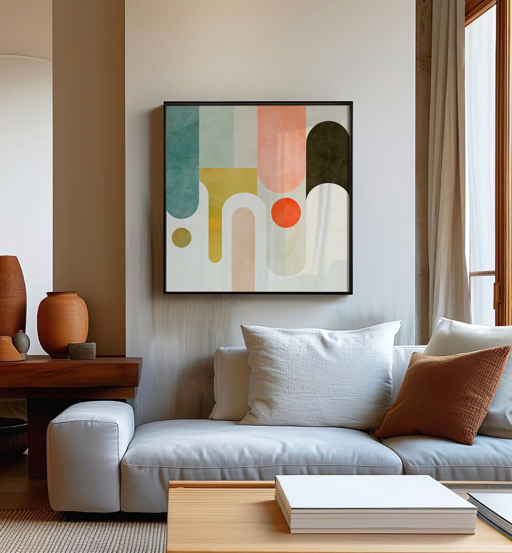 Runde Shapes Kopie By Ana Rut Bre Abstract Art Abstract Paintings in Black Plain Frame placed on a Beige Colored Wall near a White Sofa in the Living Room