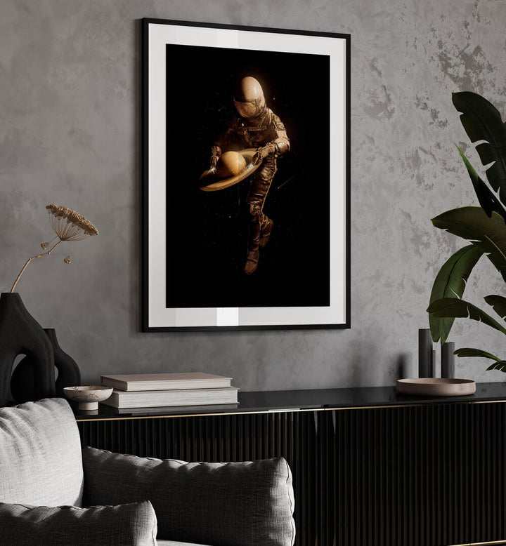 Saturntable By Francis Minoza Astronaut & Nasa Paintings, Space Art Prints Artwork in Black Frame With Mount placed on a Grey Colored Wall above a Console Table in the Living Room
