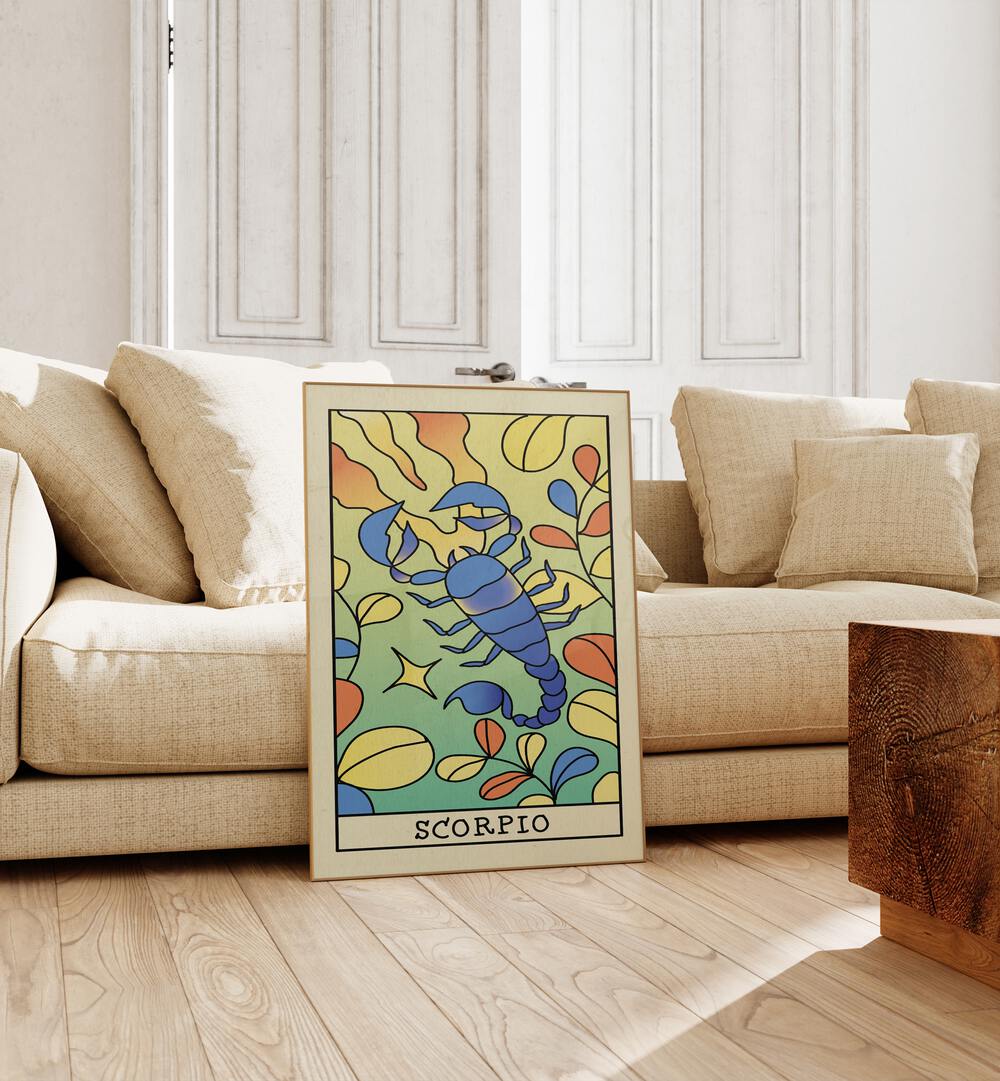 Scorpio Zodiac & Tarot Art Painting Artwork in plain oakwood frame beside a sofa