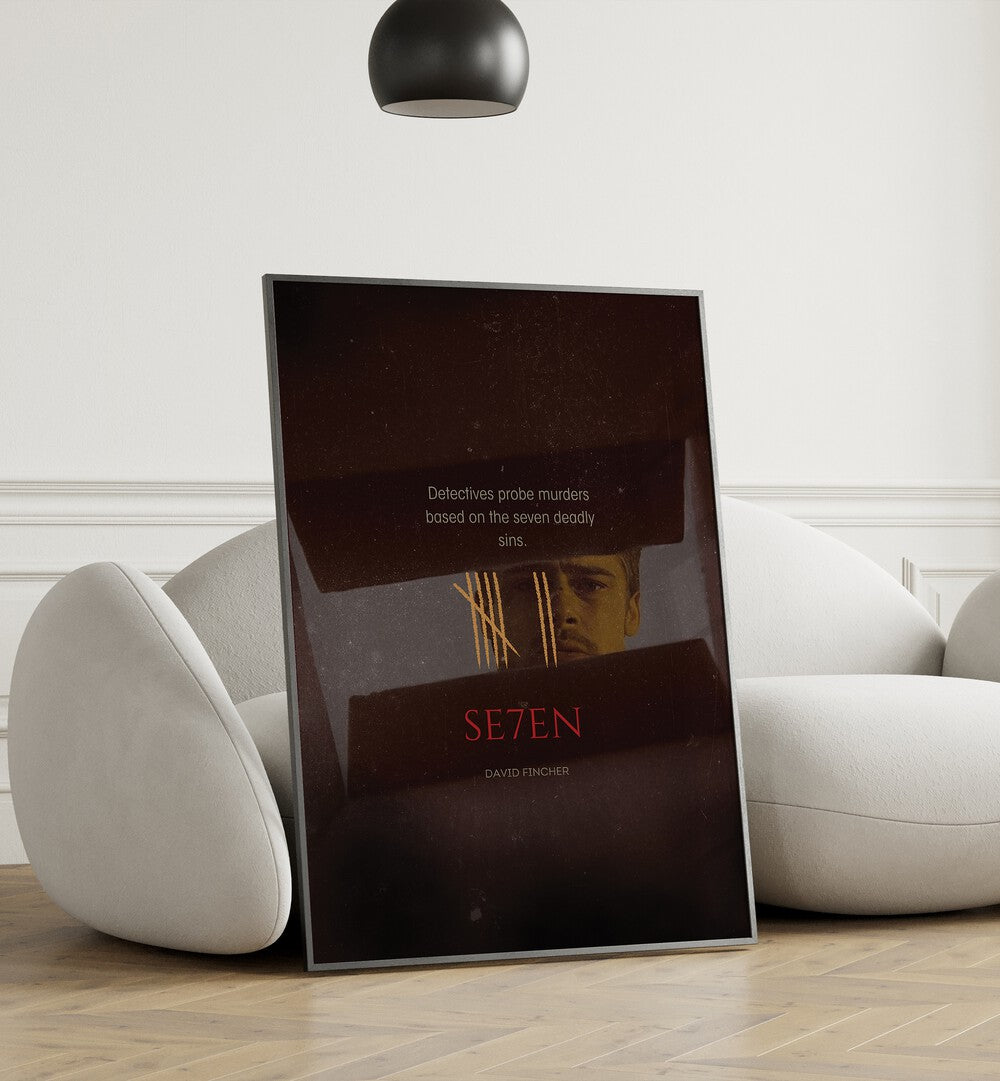 SE7EN By Grishma Korjani Movie Posters in Black Plain Frame placed on a Wooden Floor near a White Sofa in the Living Room