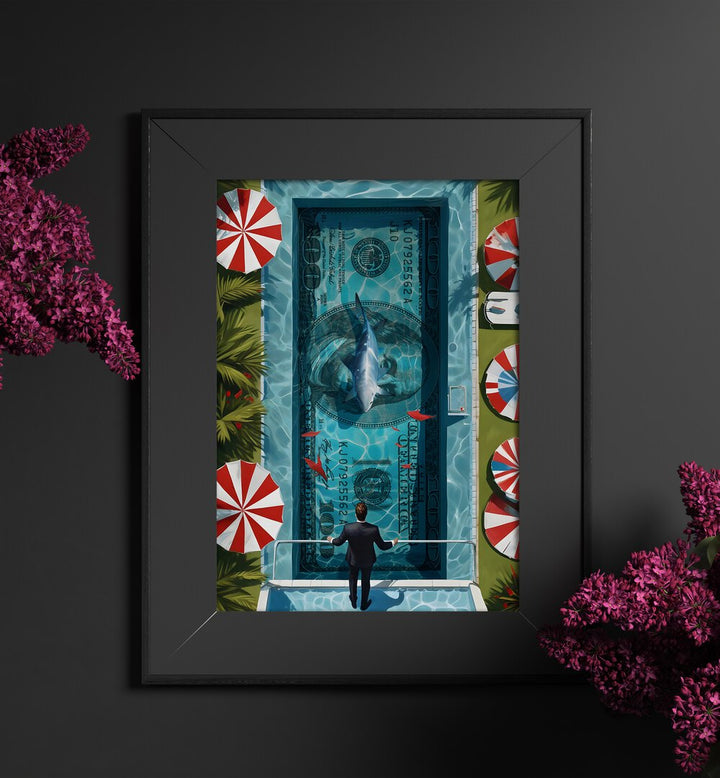 Shark Pool Money Art Artwork in black frame with mount hanging on wall near red flower plants