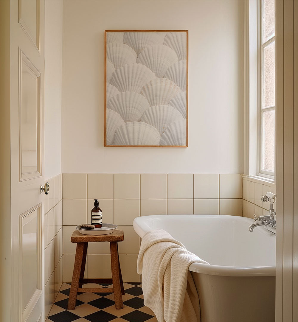 SHELLS III, BEACH PAINTINGS adorns a serene bathroom, enhancing the coastal vibe and tranquil ambiance.