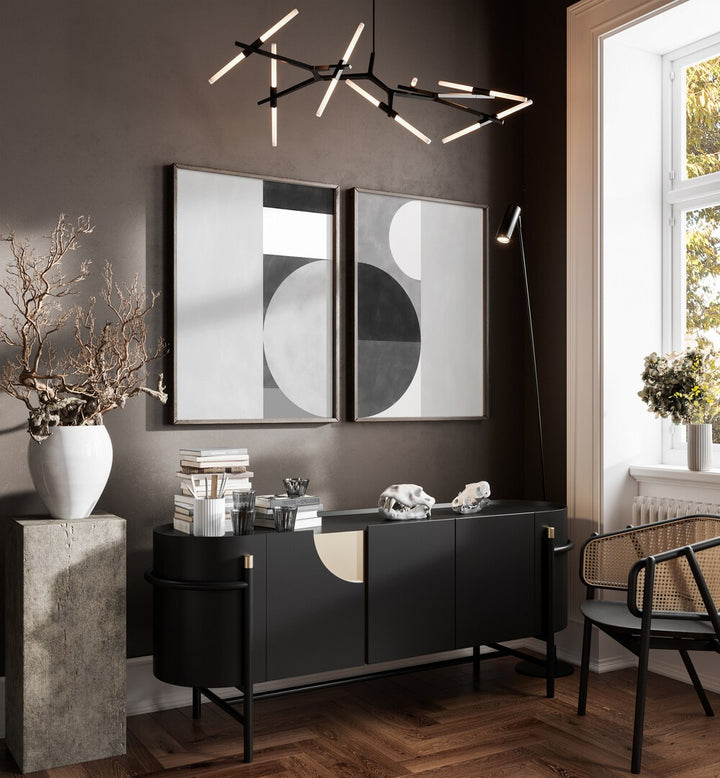 Elegant living room showcasing the SHUFFLING STEPS SET, SET OF 2 PAINTINGS, enhancing any space with creativity.
