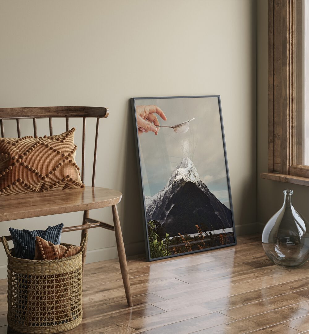 Sifted Summit M P Surreal Art Painting Artwork in plain black frame above a wooden floor beside a chair