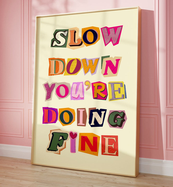 Colorful wall art featuring the phrase “SLOW DOWN YOU'RE DOING FINE” perfect for positive home decor.