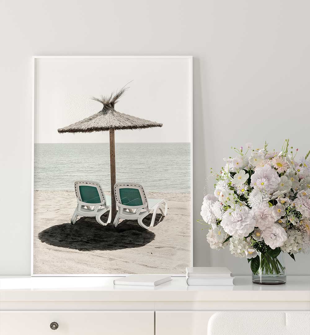 Transform your space with SOLARIS II, BEACH PAINTINGS, featuring serene beach chairs under a straw umbrella.