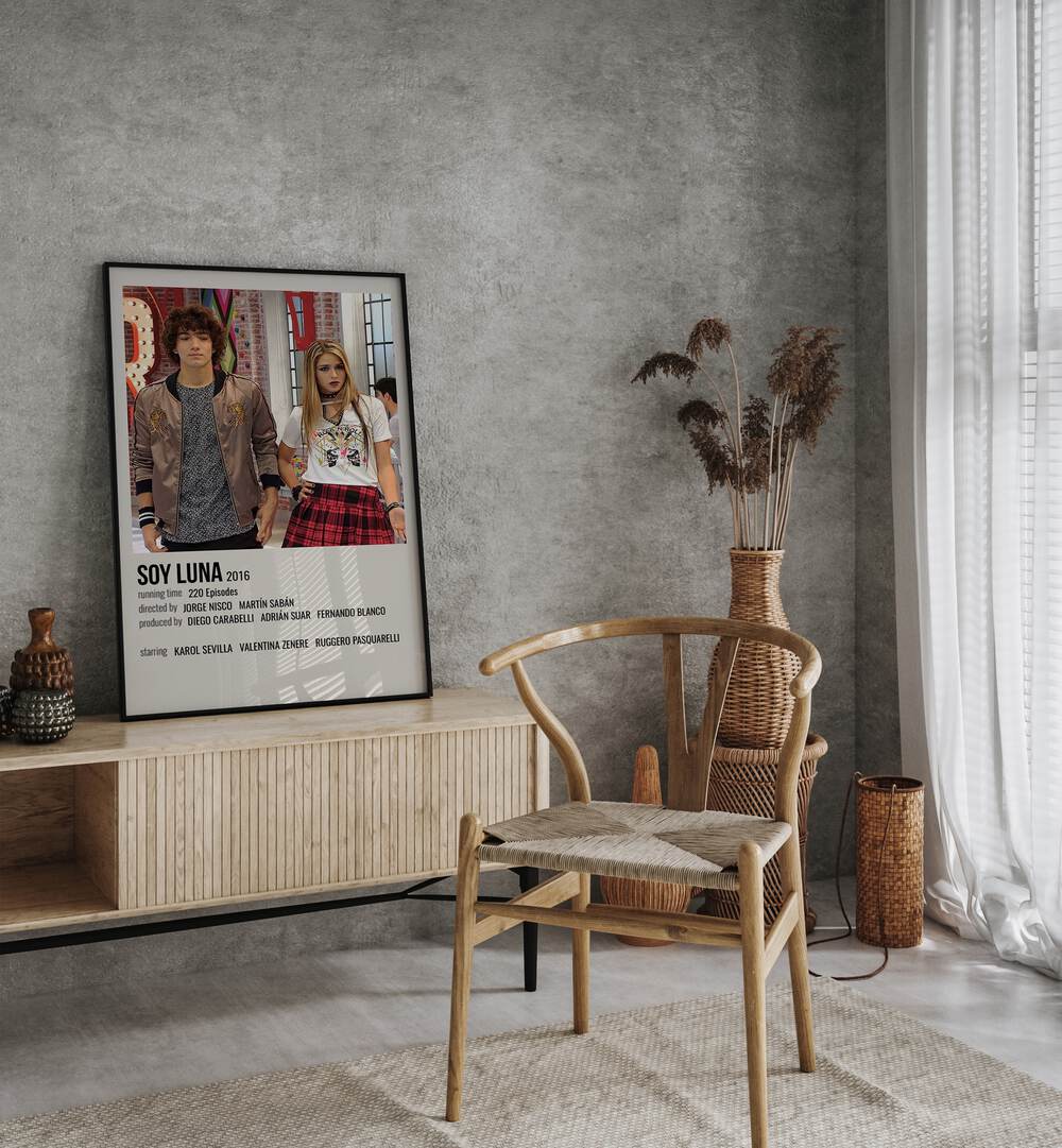 SOY LUNA 2016 MOVIE POSTERS in Black Plain Frame placed on a table beside chair