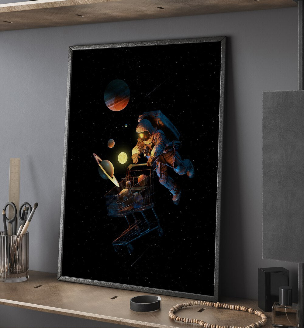 Space Cart Print By Francis Minoza Astronaut & Nasa Paintings, Space Art Prints Artwork in Black Plain Frame placed above a Wooden Shelf
