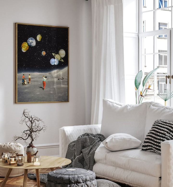 Space Golf By Taudalpoi Astronaut & Nasa Paintings, Space Art Prints Artwork in Oak Wood Plain Frame placed on a White Colored Wall near a White Sofa in the Living Room


 
