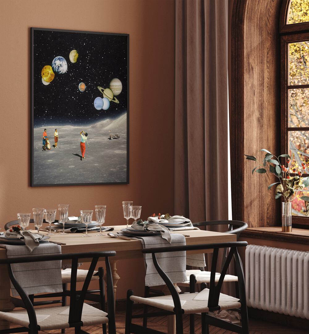 Space Golf By Taudalpoi Astronaut & Nasa Paintings, Space Art Prints Artwork in Black Plain Frame placed on a Brown Colored Wall near a Dining Table in the Dining Room



